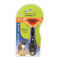 Orange Furminator in retail packaging that removes undercoat and loose fur – close-up of comb and teeth